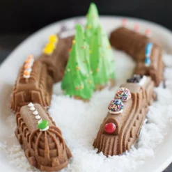 Nordic Ware Express Cakelet Pan -Baking pan Shop 91977 nordic ware express train cakelet pan lifestyle closeup