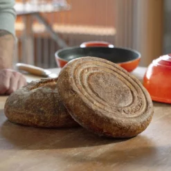 Le Creuset 9.5" Signature Bread Oven | Flame -Baking pan Shop bread oven lifestyle 2 1