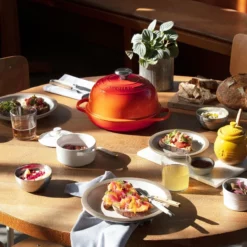 Le Creuset 9.5" Signature Bread Oven | Flame -Baking pan Shop bread oven lifestyle 4