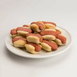 NewMetro Design Silicone Baking Mold 12 Hot Dog Bites -Baking pan Shop mini hotdogs on plate