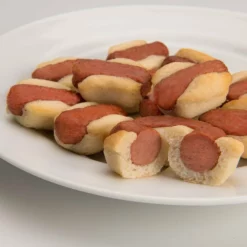 NewMetro Design Silicone Baking Mold 12 Hot Dog Bites -Baking pan Shop mini hotdogs on plate sliced